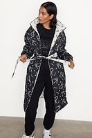 Thumbnail for caption_Model wears Mono Swallow Romance Reversible Coat in size S