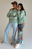 Thumbnail for caption_Model wears Sage Sundazed Sweatshirt in size M