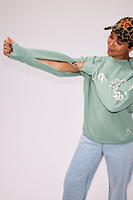 Thumbnail for caption_Model wears Sage Sundazed Sweatshirt in size M