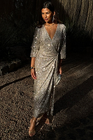 Thumbnail for caption_Model wears Silver Sequin Kira Wrap Dress in UK size 8/ US 4