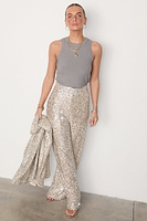 Thumbnail for caption_Model wears Silver Sequin Freddie Trousers in UK size 10/ US 6