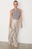 Thumbnail for caption_Model wears Silver Sequin Freddie Trousers in UK size 10/ US 6