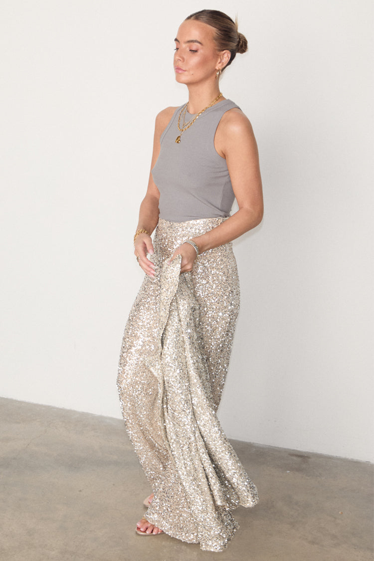 caption_Model wears Silver Sequin Freddie Trousers in UK size 10/ US 6