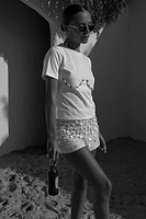 Thumbnail for caption_Model is 5ft6” and wears size M