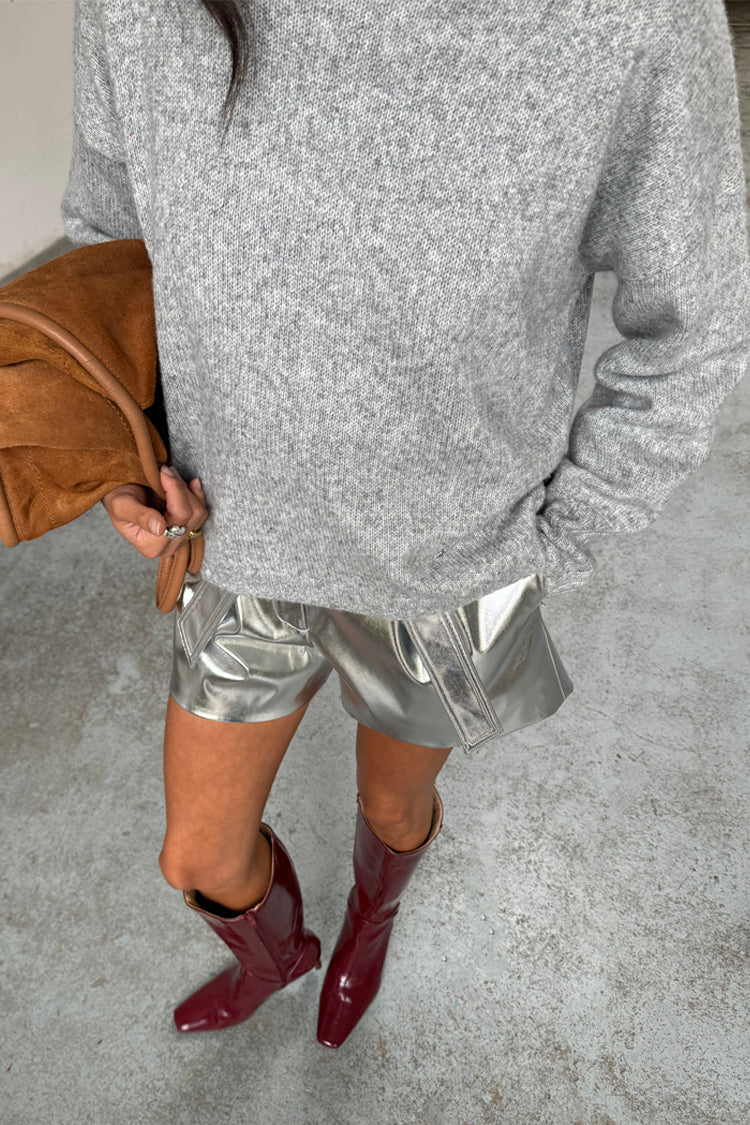 caption_Model wears Silver Vegan Leather Shorts in UK size 8/ US 4