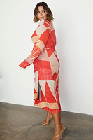 Thumbnail for caption_Model wears Reversible Sundial Wrap Dress in UK size 18 / US 14