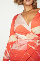 Thumbnail for caption_Model wears Reversible Sundial Wrap Dress in UK size 18 / US 14