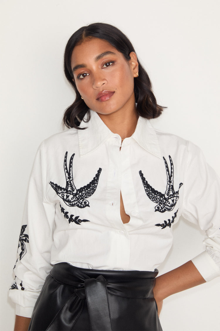 caption_Model wears White Embroidered Swallow Shirt in UK size 10/ US 6