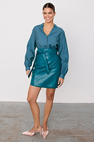 Thumbnail for caption_Model wears Teal Vegan Leather Mini Jaspre Skirt in UK size 10/ US 6