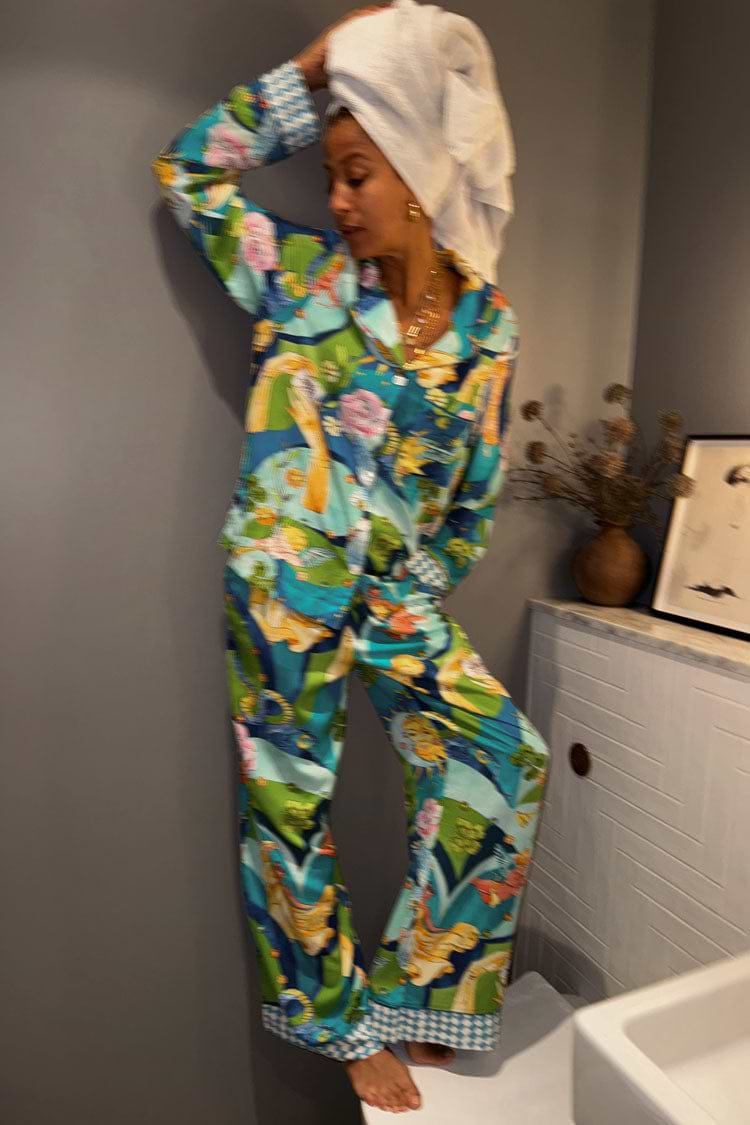 caption_Model wears  Blue Mystical Button Through Pyjamas in UK size 8/ US 4