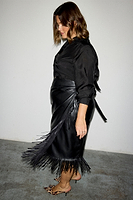 Thumbnail for caption_Model wears Black Vegan Leather Fringe Jaspre Skirt in UK size 18/ US 14