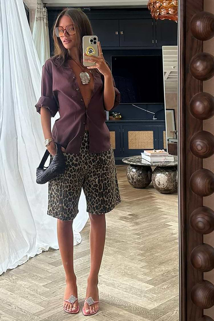 caption_Model wears Leopard Lucia Scallop Pocket Long Shorts in UK size 10/ US 6