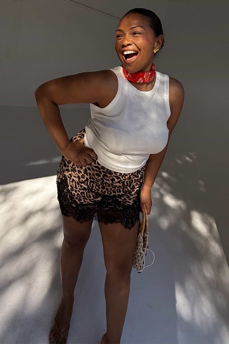 caption_Model wears Leopard Lace Maeva Skirt  in UK size 16/ US 12