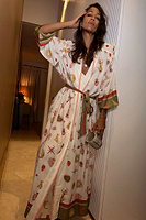 Thumbnail for caption_Model wears Cream Mystical Maxi Robe in size M