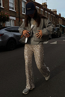 Thumbnail for caption_Model wears Silver Sequin Freddie Trousers in UK size 10/ US 6