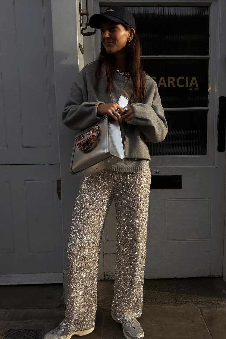  caption_Model wears Silver Sequin Freddie Trousers in UK size 10/ US 6