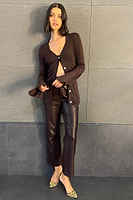 Thumbnail for Model Chocolate Vegan Leather Trouser standing facing the camera
