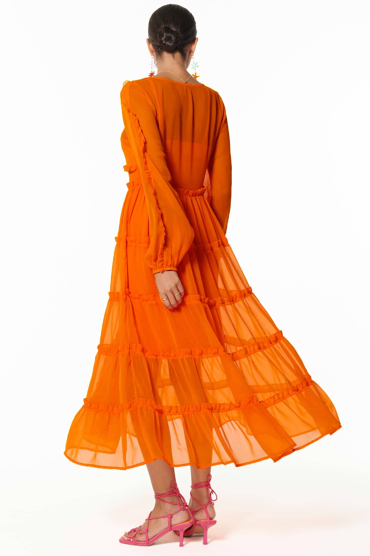 Model wearing Orange Clemmie Dress back shot