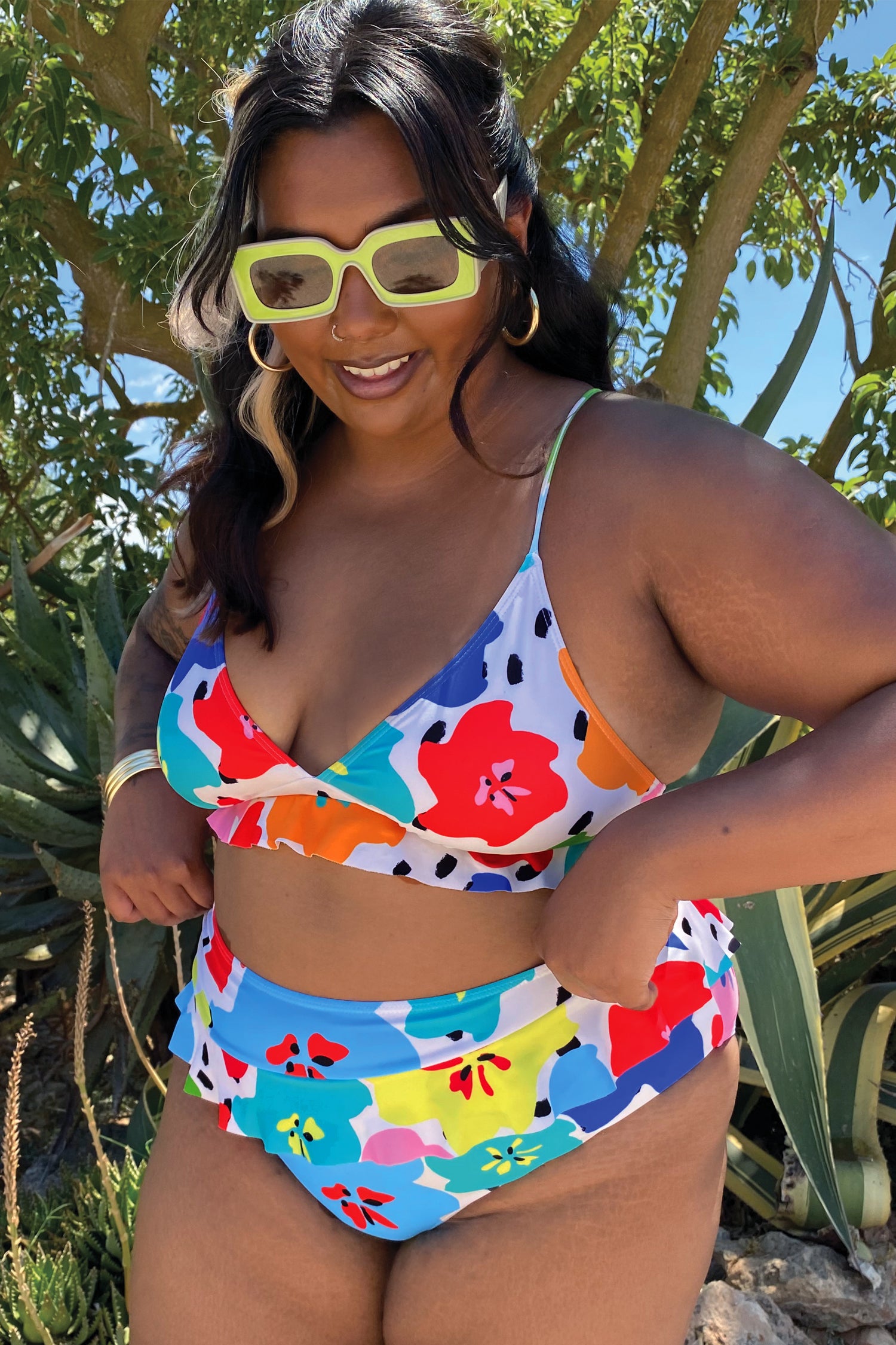 Model wearing Dotty Bikini Bottom standing facing the camera