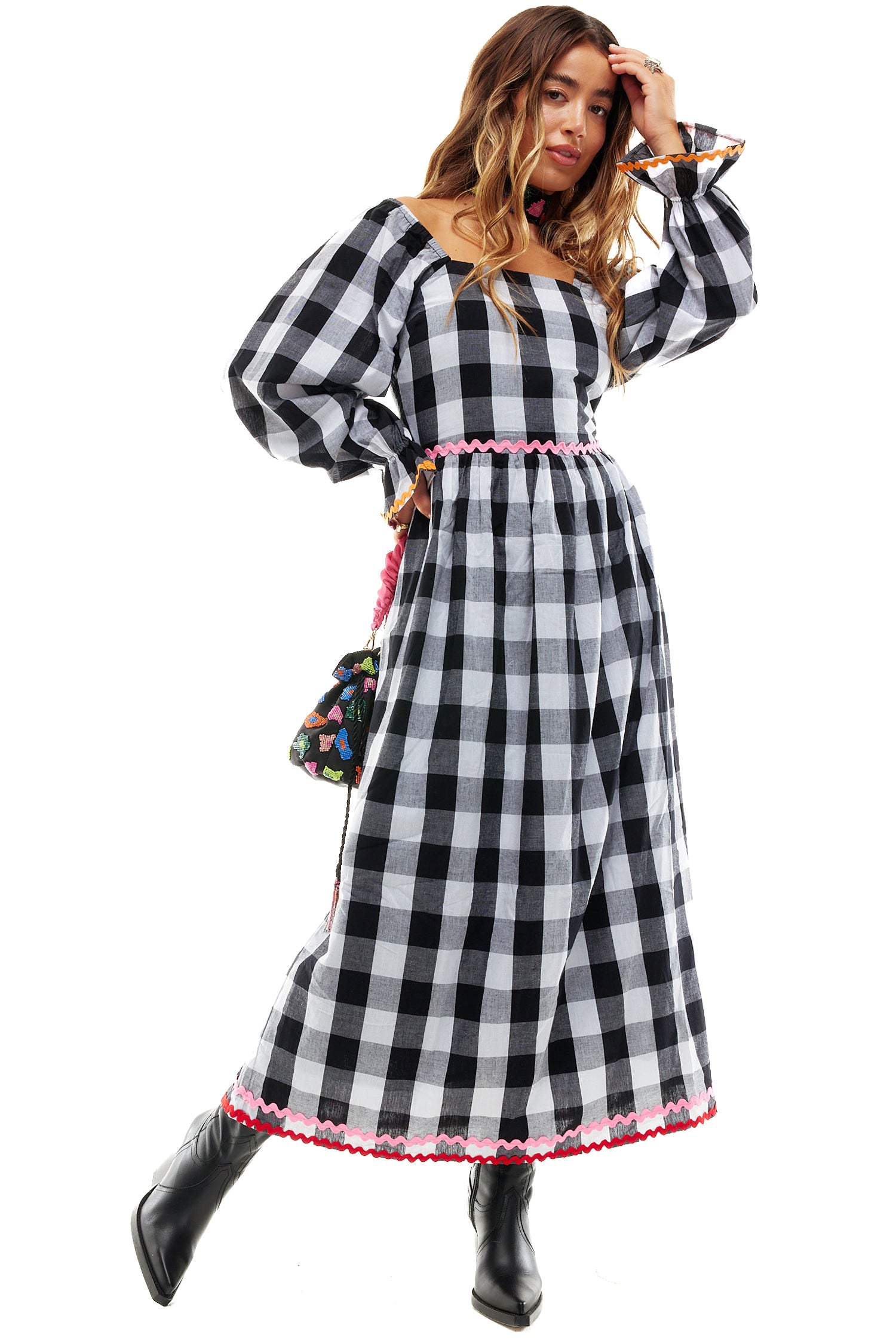 Model wearing Gingham Macy Midi Dress standing facing the camera 