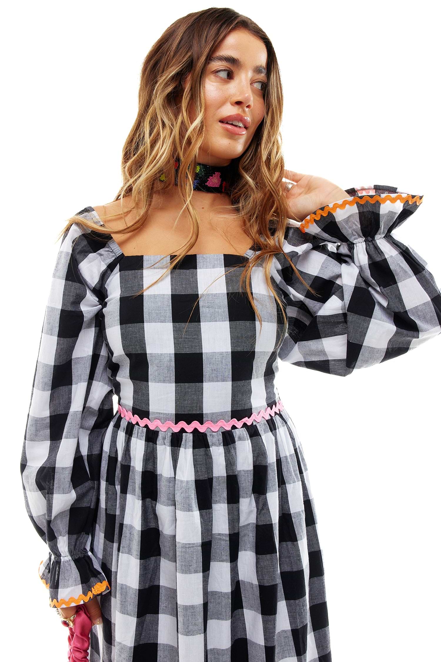 Model wearing Gingham Macy Midi Dress standing facing the camera 