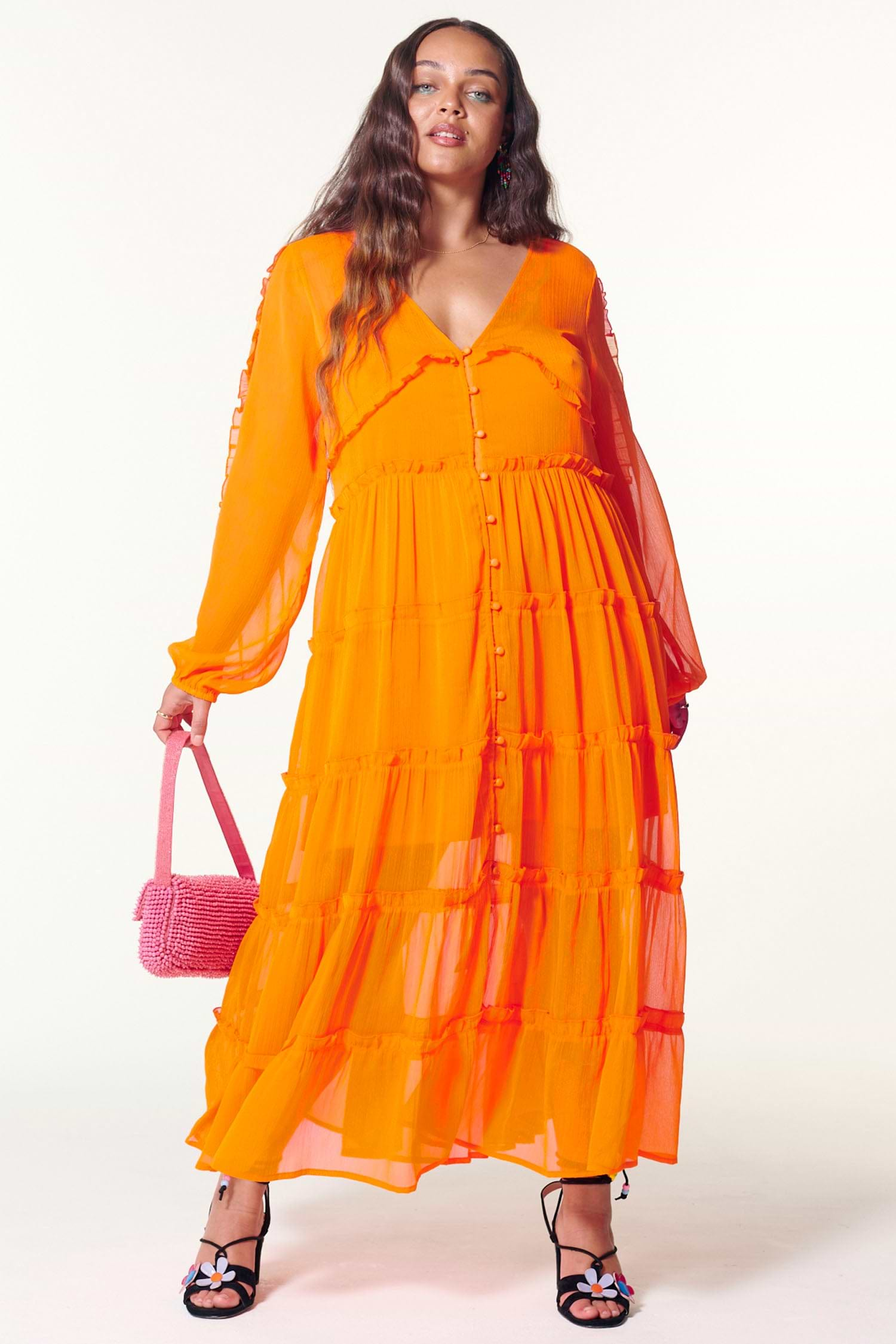 Model wearing Orange Clemmie Dress