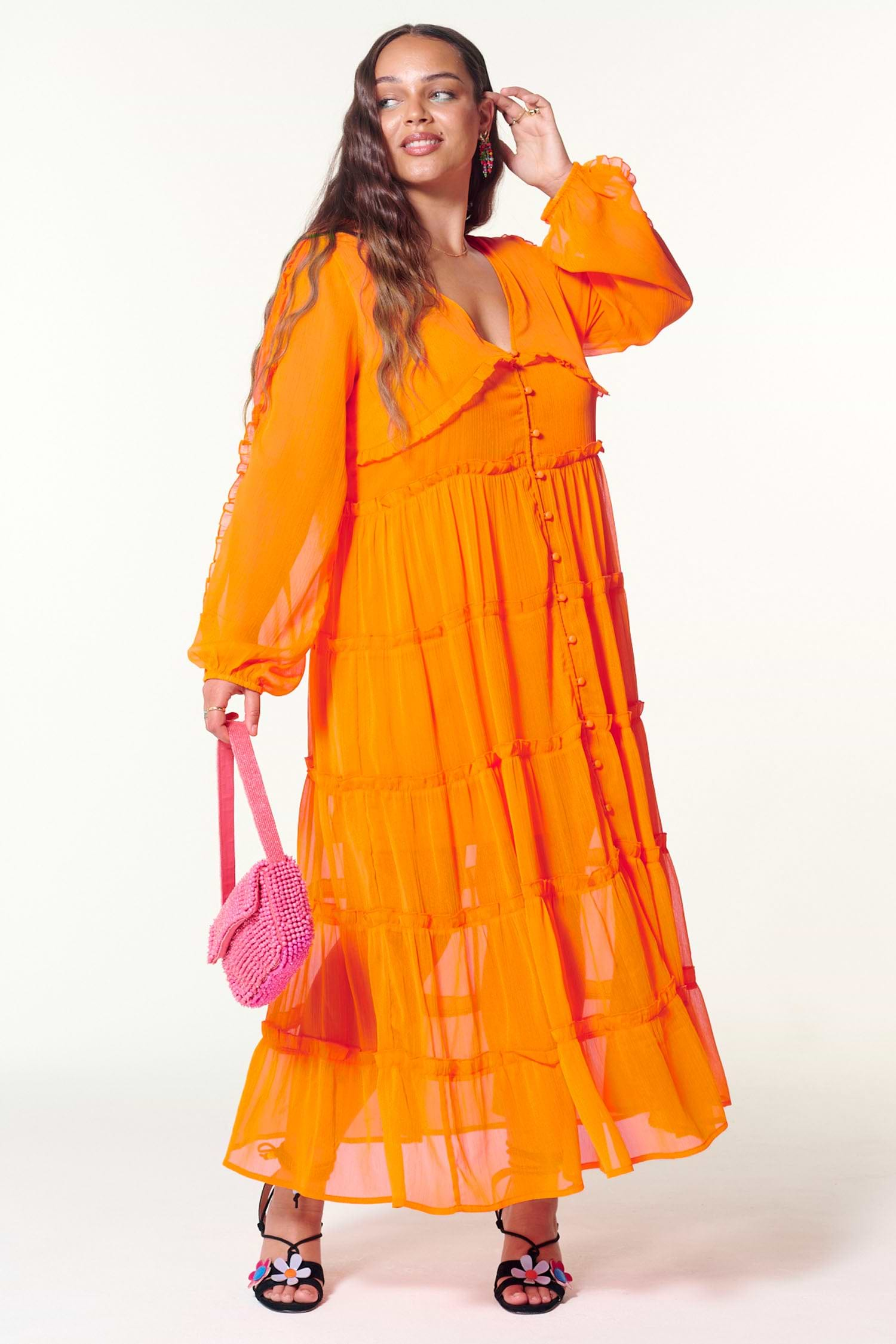 Model wearing Orange Clemmie Dress