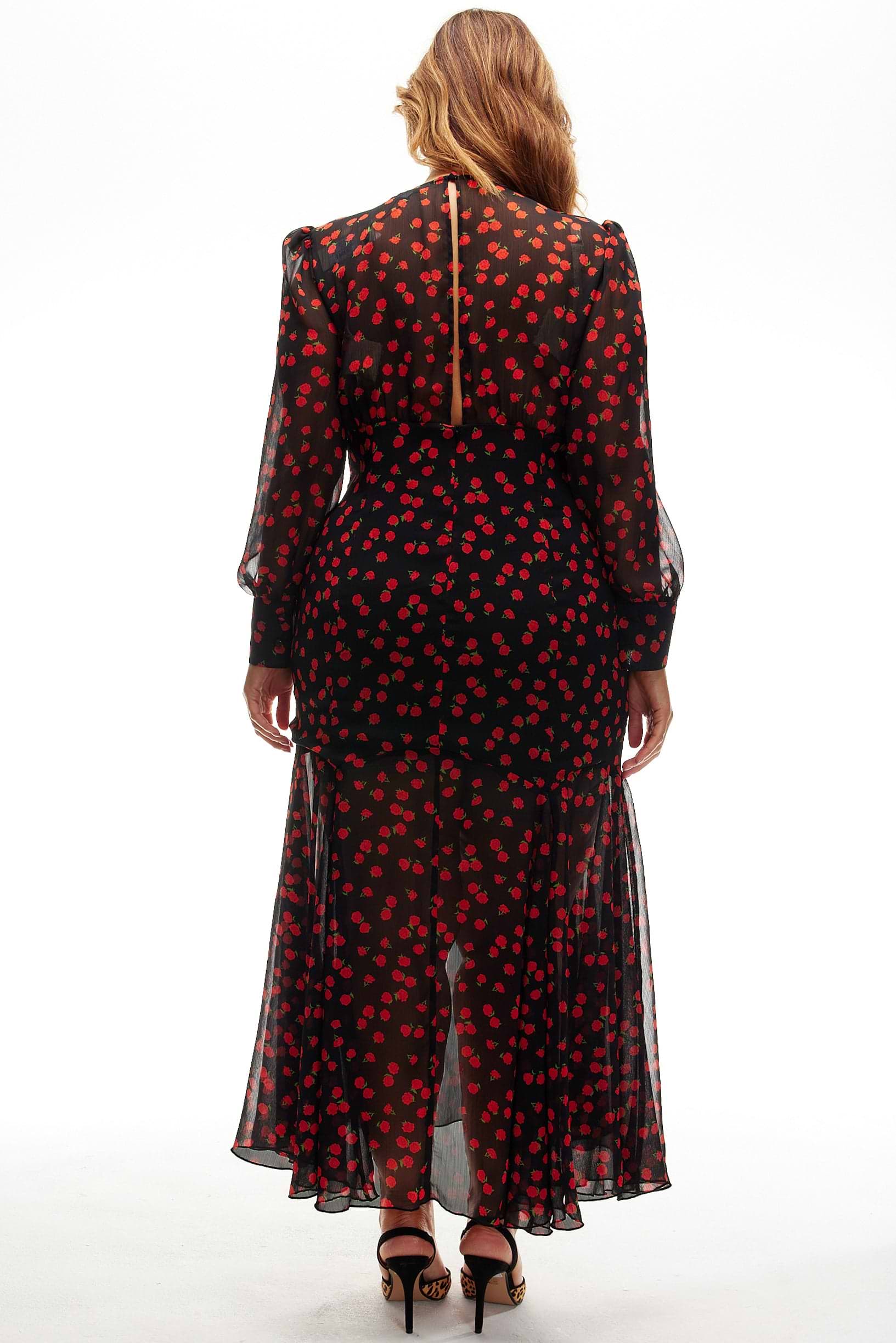 Model Wearing Black Rena Rose Midi Dress standing facing away from the camera
