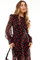 Thumbnail for Model Wearing Black Rena Rose Midi Dress standing facing the camera