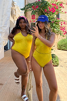 Thumbnail for Model wearing Yellow Palm Swimsuit facing the camera