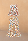 Girl's cream cotton co-ord set with a multicoloured banana print, featuring a peplum top and flared trousers.