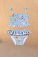 Girl's Starburst crop bikini set in blue with smocked frill top and matching ruffle-waisted bottoms.