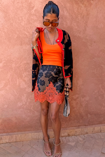 Coral Scoop Neck Rib Tank styled with a patterned lace trim mini skirt and cardigan