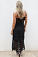 Model wearing Black Star Sasha Dress standing facing the camera