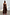 Thumbnail for Model wearing Chocolate Lola Mid-axi Dress featuring a strapless ruched bodice and full brown cotton skirt.