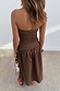Back view of the Chocolate Lola Mid-axi Dress featuring a ruched bodice and a full brown gathered cotton skirt.