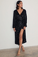 caption_Model wears Black Sequin Kira Wrap Dress in UK size 10/ US 6