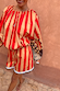Red and camel Tomato Stripe Blouse with gathered neckline and matching shorts styled as a co-ord set.