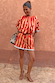 Red and camel striped Tomato Stripe Blouse worn as a co-ord with matching shorts.
