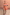 Thumbnail for Tomato Stripe Scarf worn as a red and beige off-the-shoulder multi-wear dress on a model.