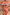 Thumbnail for Tomato Stripe Scarf styled as a multi-wear red and tan striped off-the-shoulder dress.