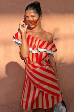 Tomato Stripe Scarf in red and cream, styled as a multi-wear ruffled dress on a model.