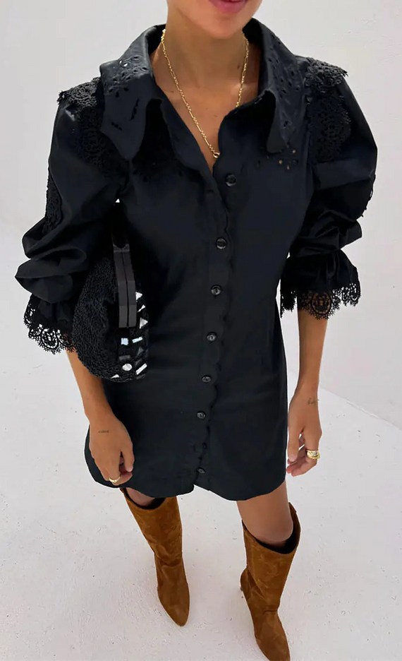 close up image of our black sicily shirt dress paired with suede brown knee high boots