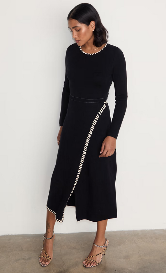 model is wearing the black and cream sydney wrap dress