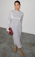 model is wearing our silver plisse sophia dress with a burgundy clutch bag 