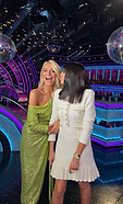 tess daly wearing our lime sequin dress, standing next to claudia winkleman