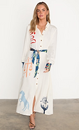 model is wearing the mystical print shirt dress