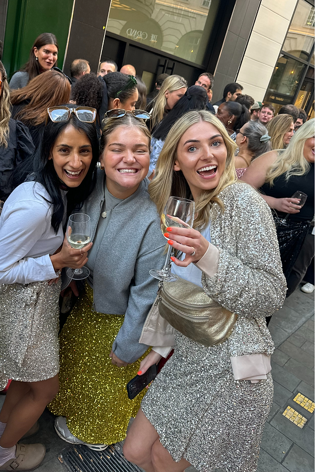 some of our staff at our sequin march event wearing sequins from NFD 