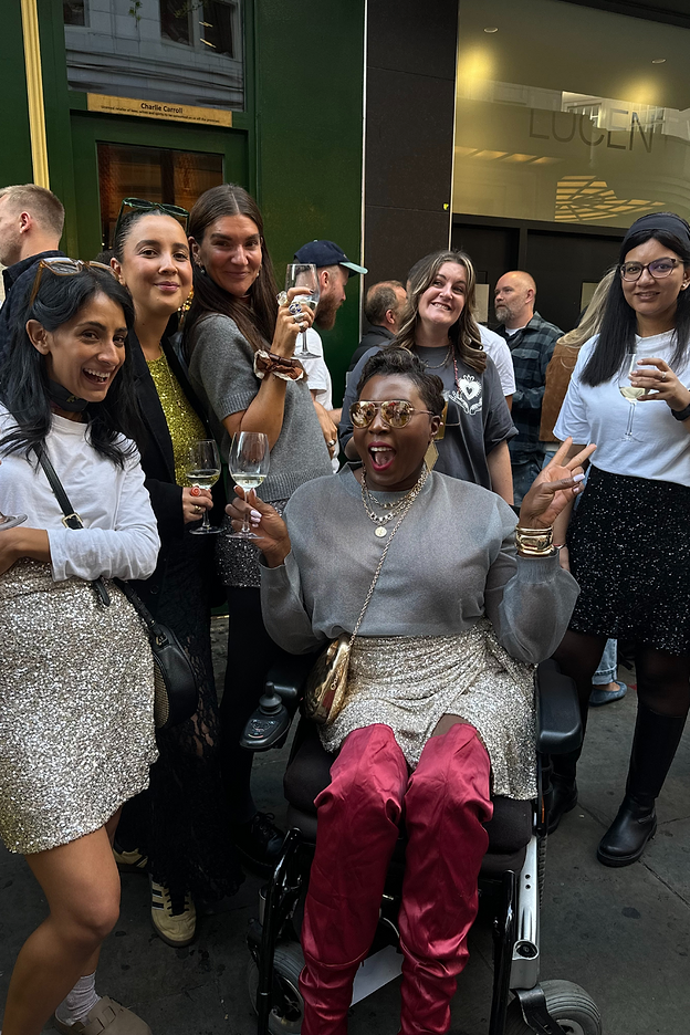 customers and staff outside the devonshire for our sequin march event 