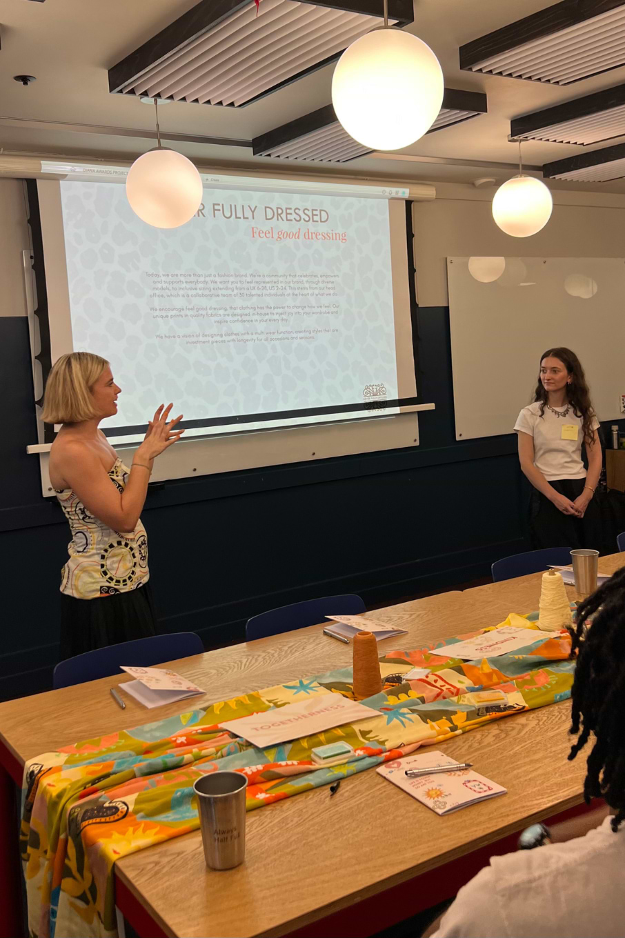 our staff speaking to young leaders about the brand